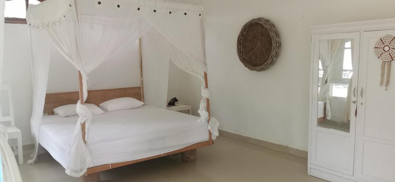 The Village Rua Beach Homestay ภายนอก รูปภาพ