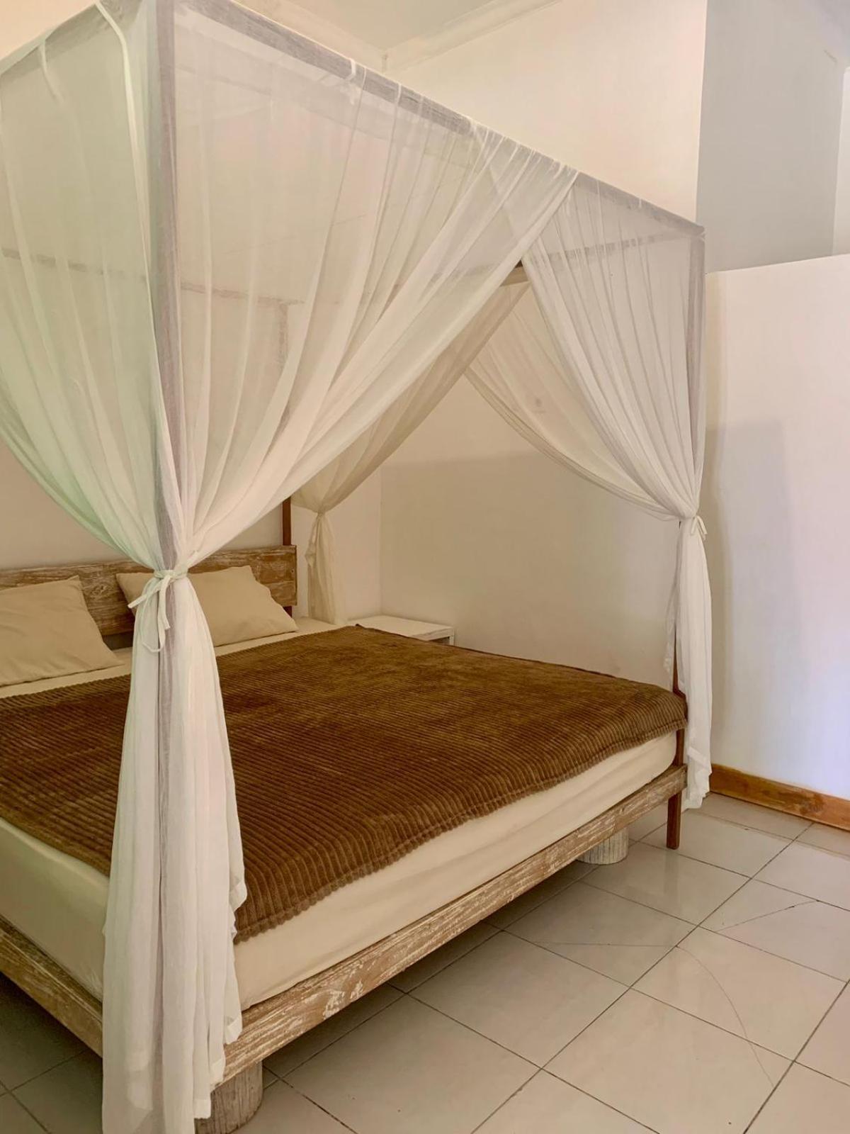 The Village Rua Beach Homestay ภายนอก รูปภาพ