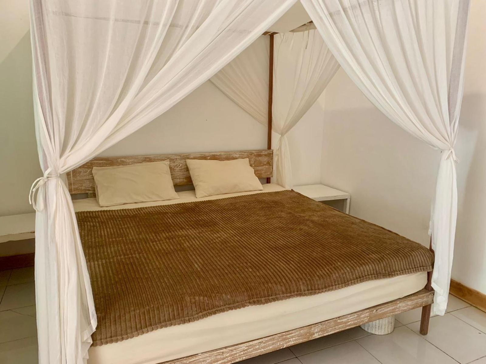The Village Rua Beach Homestay ภายนอก รูปภาพ