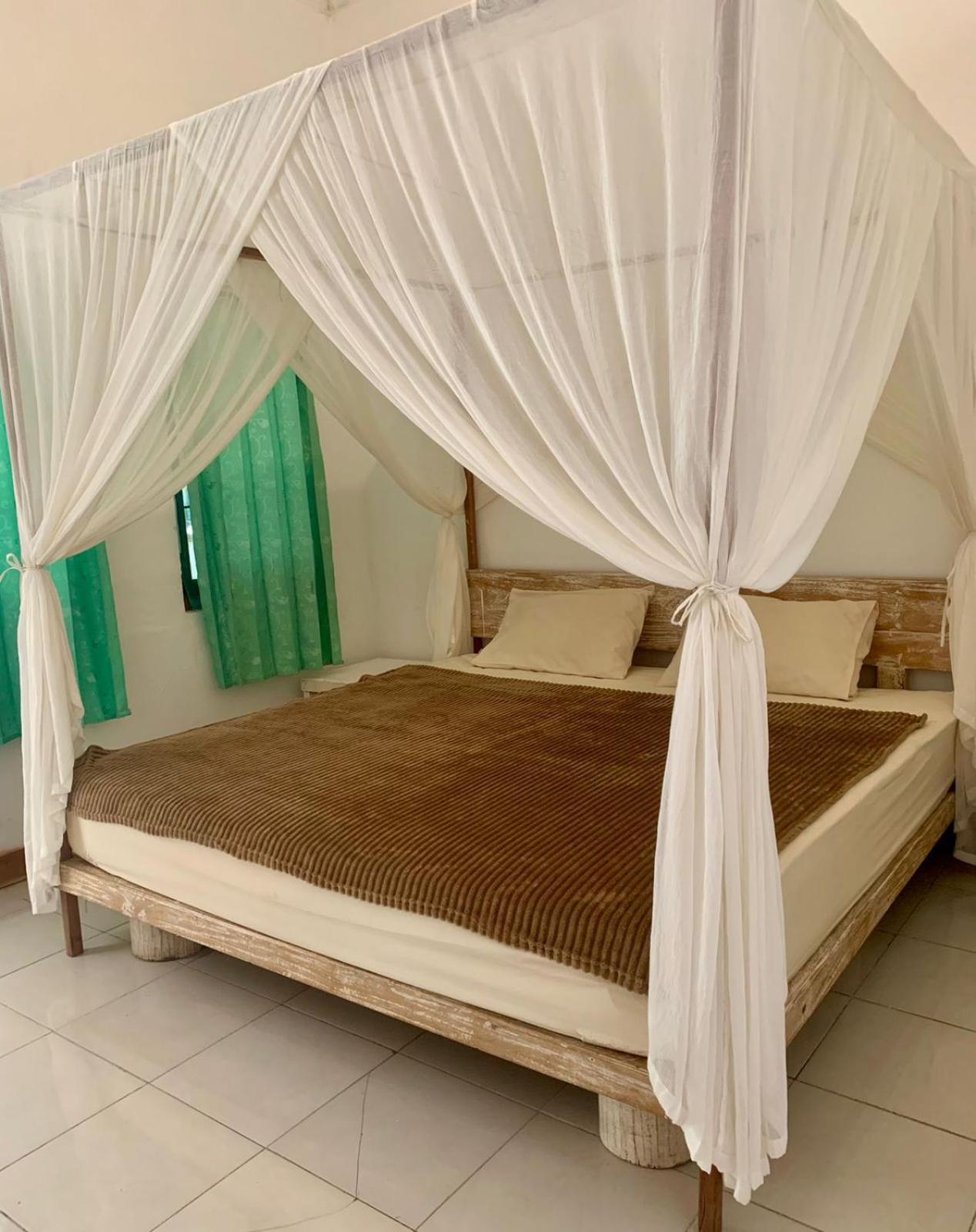 The Village Rua Beach Homestay ภายนอก รูปภาพ